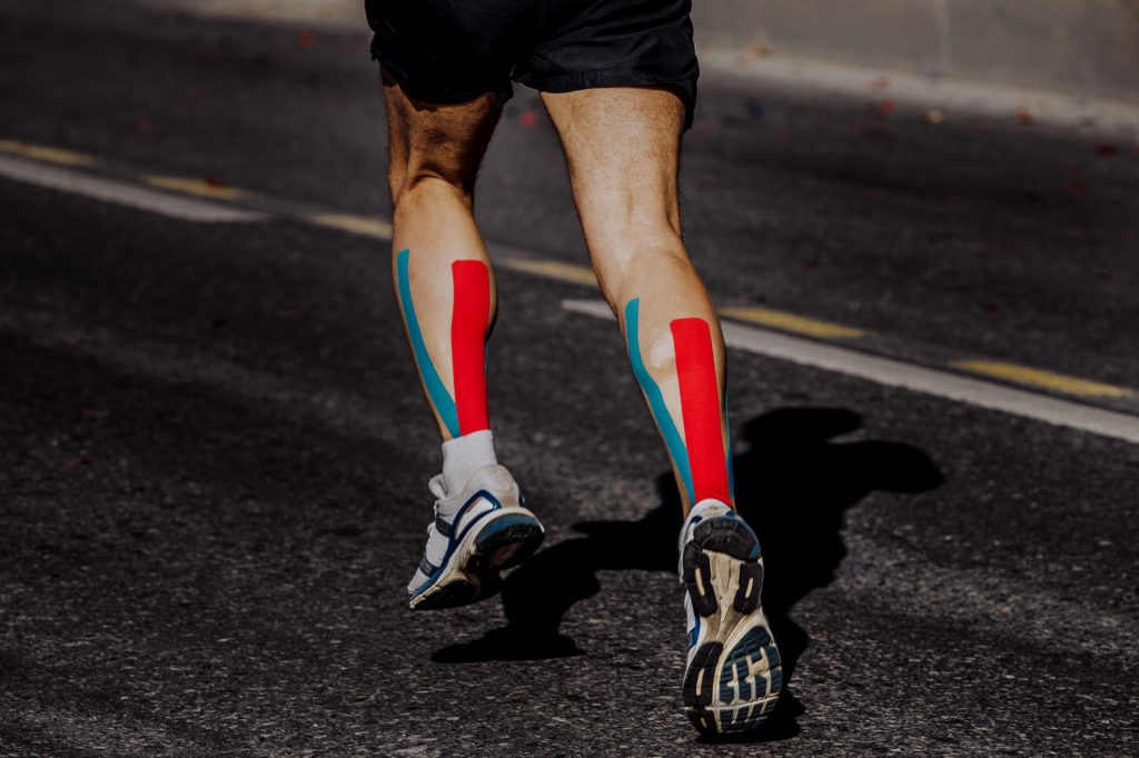 kinesio-taping-on-muscles-calf-runner-by-wellnestpro